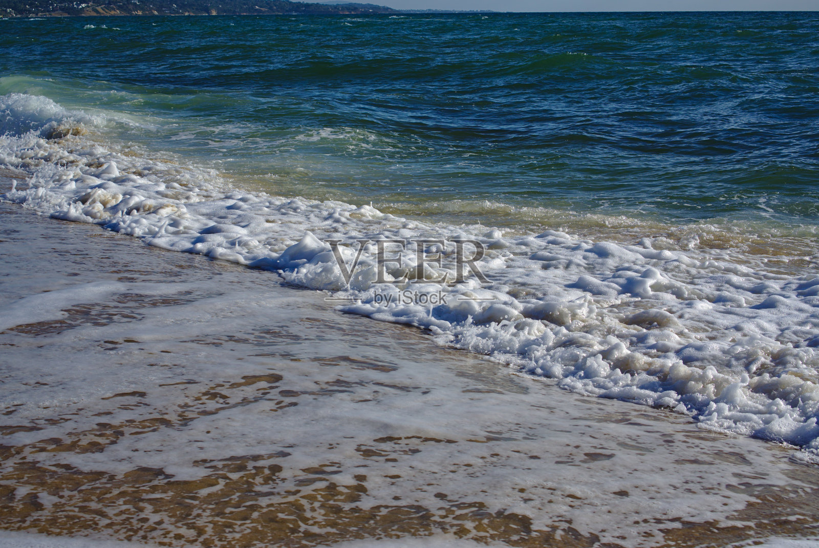 波在海滩照片摄影图片