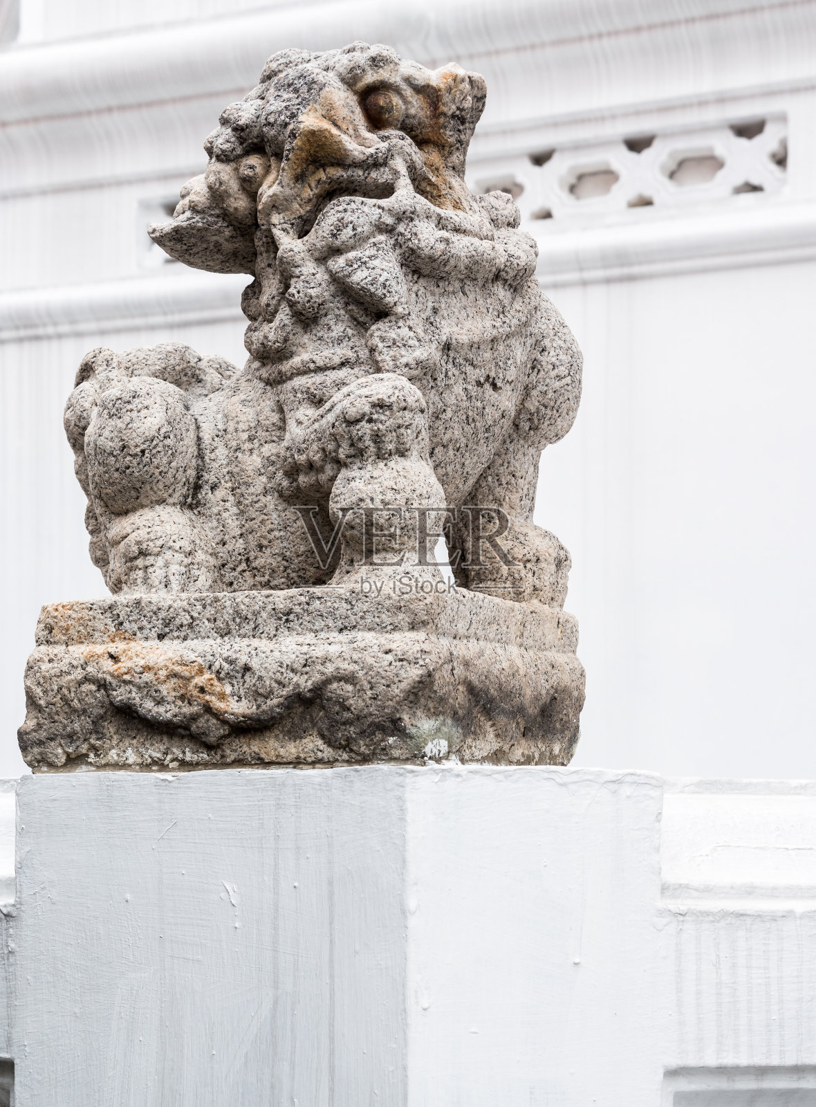 中国传统风格的石狮雕像。照片摄影图片