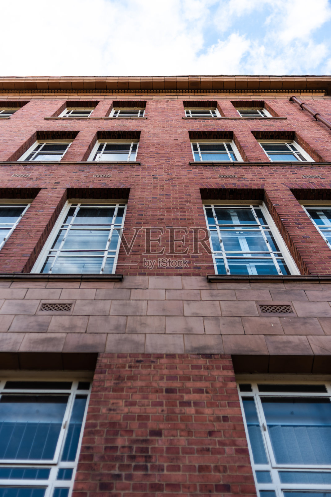 历史悠久的曼彻斯特大学建筑外墙蓝天照片摄影图片