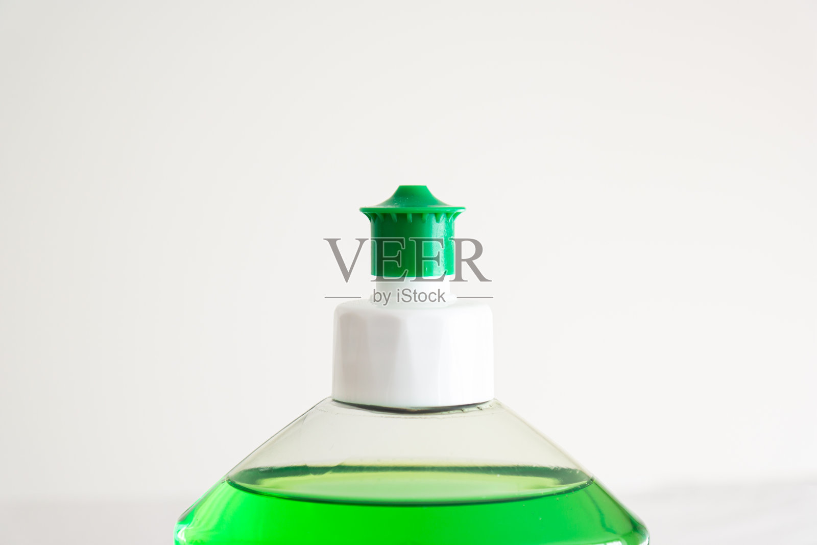 液体洗碗机肥皂瓶近距离拍摄的绿色喷雾器喷嘴照片摄影图片