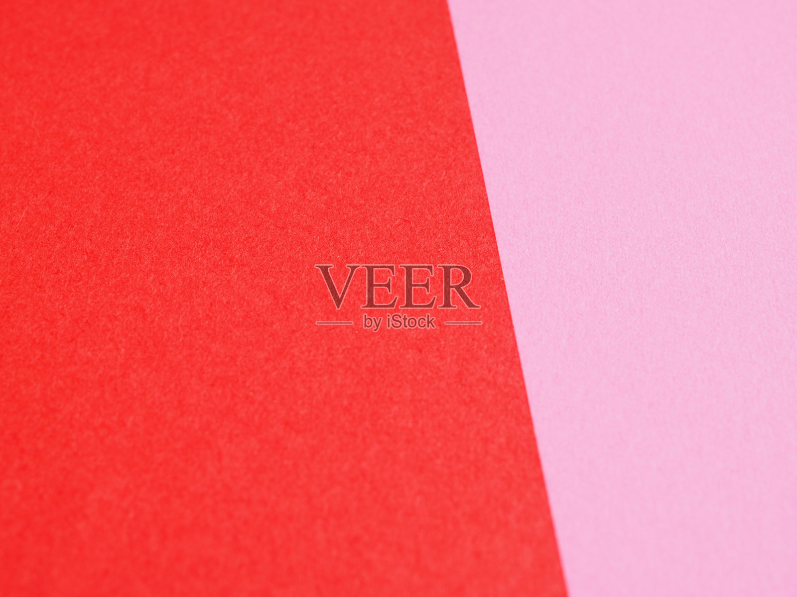 明亮的红色和粉红色的纸张作为背景和设计，柔和的背景模糊。照片摄影图片