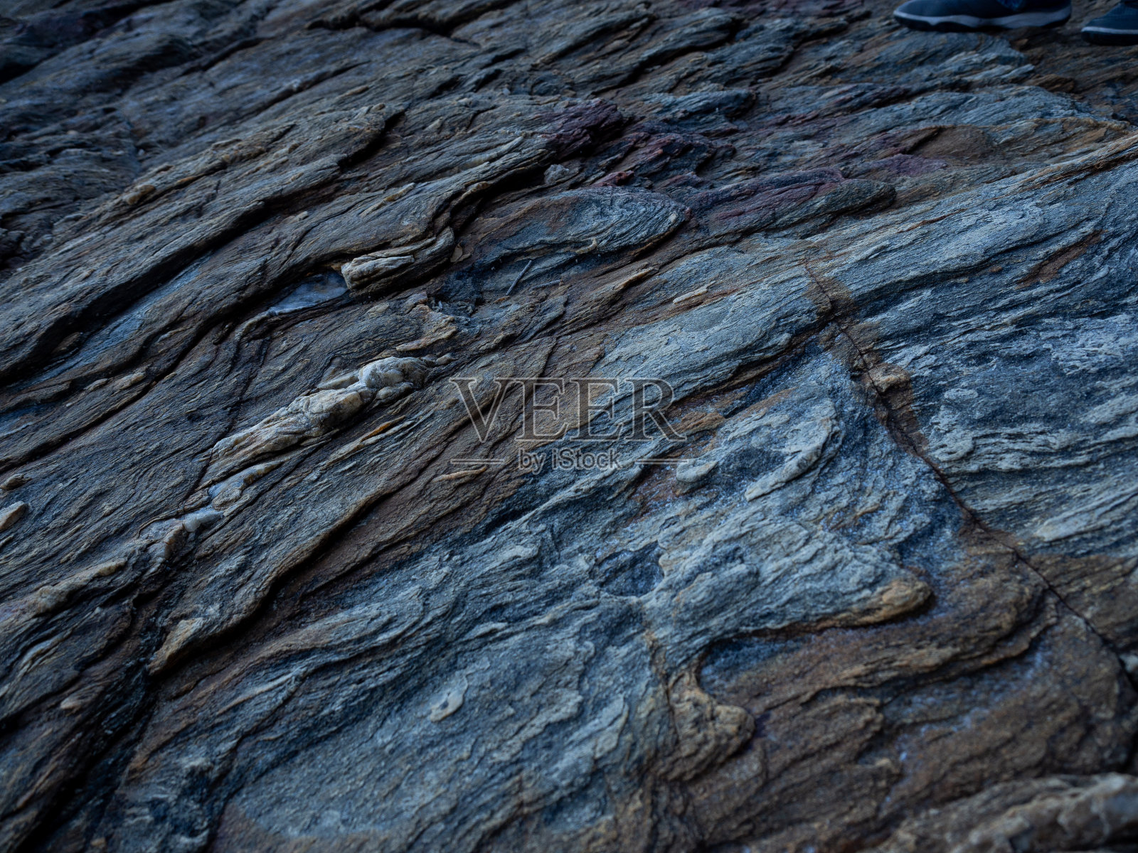 岩石海岸图案背景，自然背景和壁纸。照片摄影图片