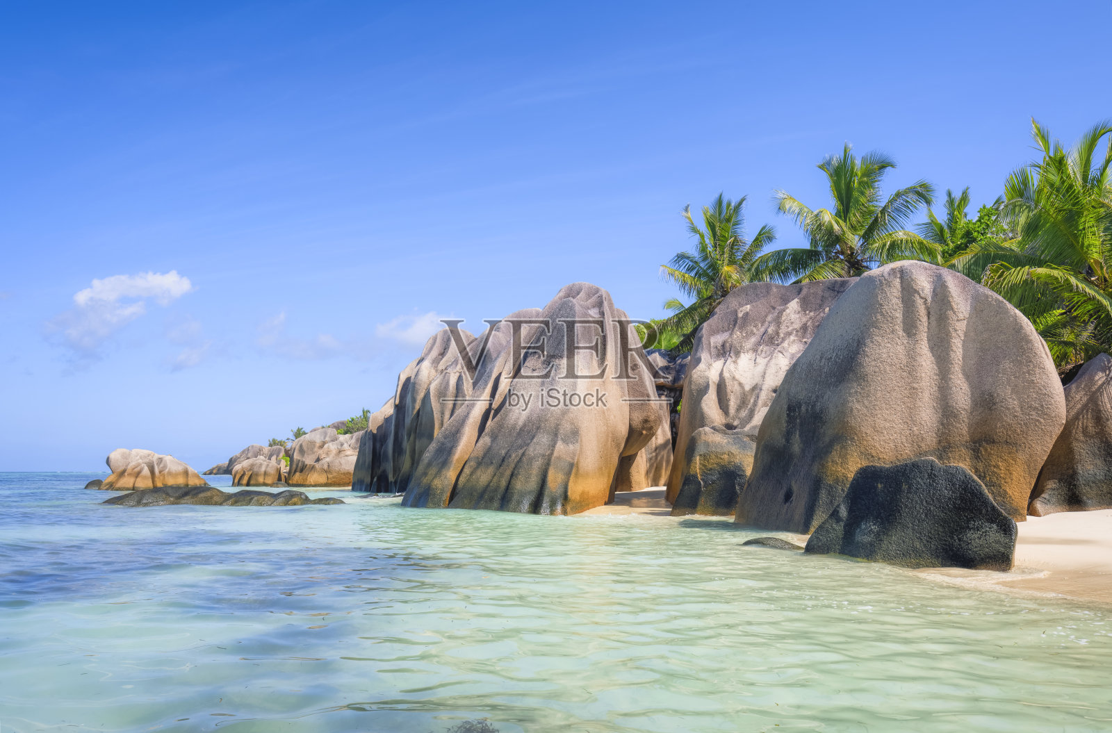 美丽的热带海滩Anse Source d´银白色雕刻花岗岩和棕榈树-拉迪格岛，塞舌尔，印度洋群岛。照片摄影图片