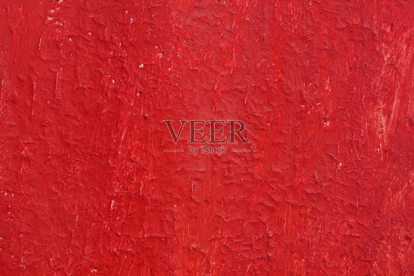 复古红色背景与旧红漆粗糙表面，条纹和不均匀的纹理的红色油漆在旧粗糙表面照片摄影图片
