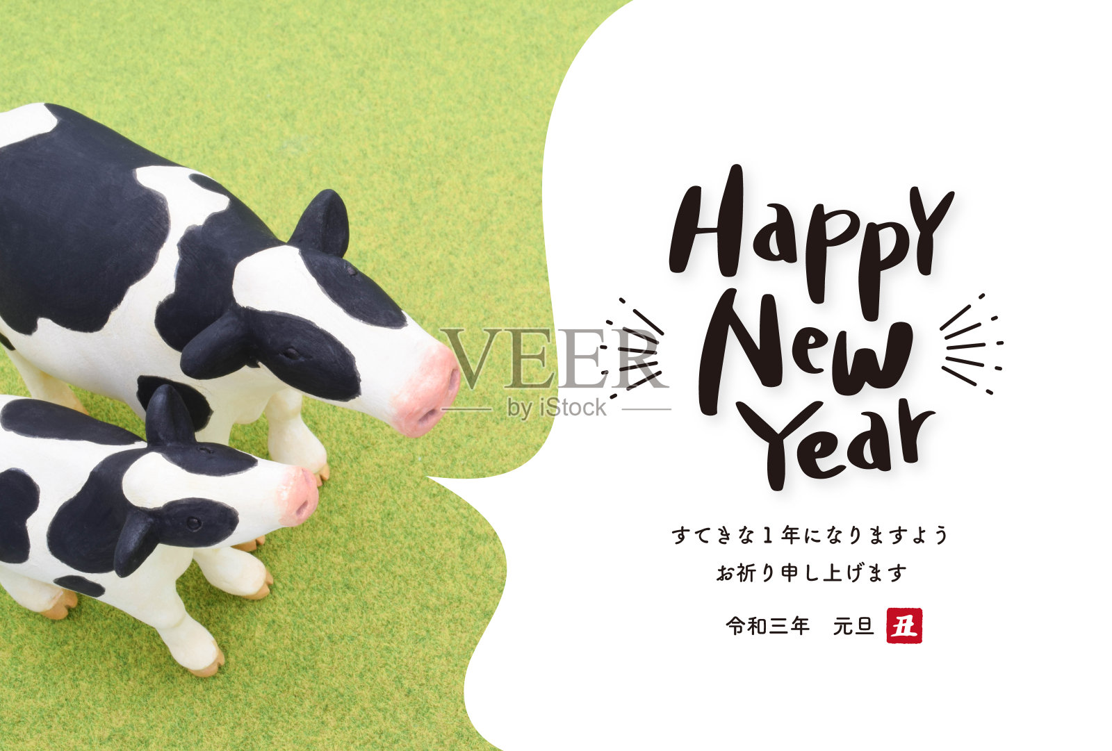 2021年贺年卡设计的泥塑牛。照片摄影图片