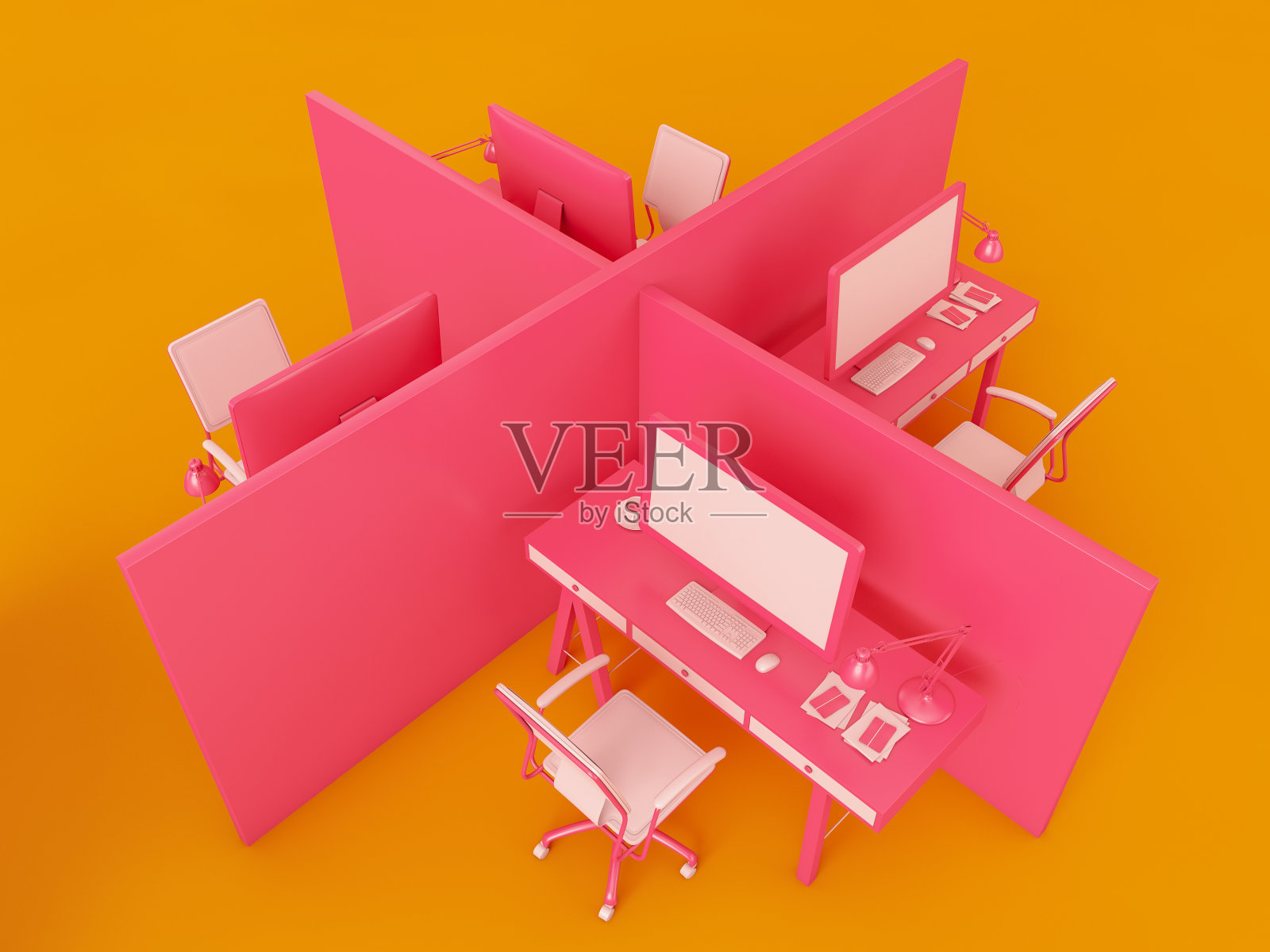 最小的空间概念。粉红色的电脑在办公桌上照片摄影图片