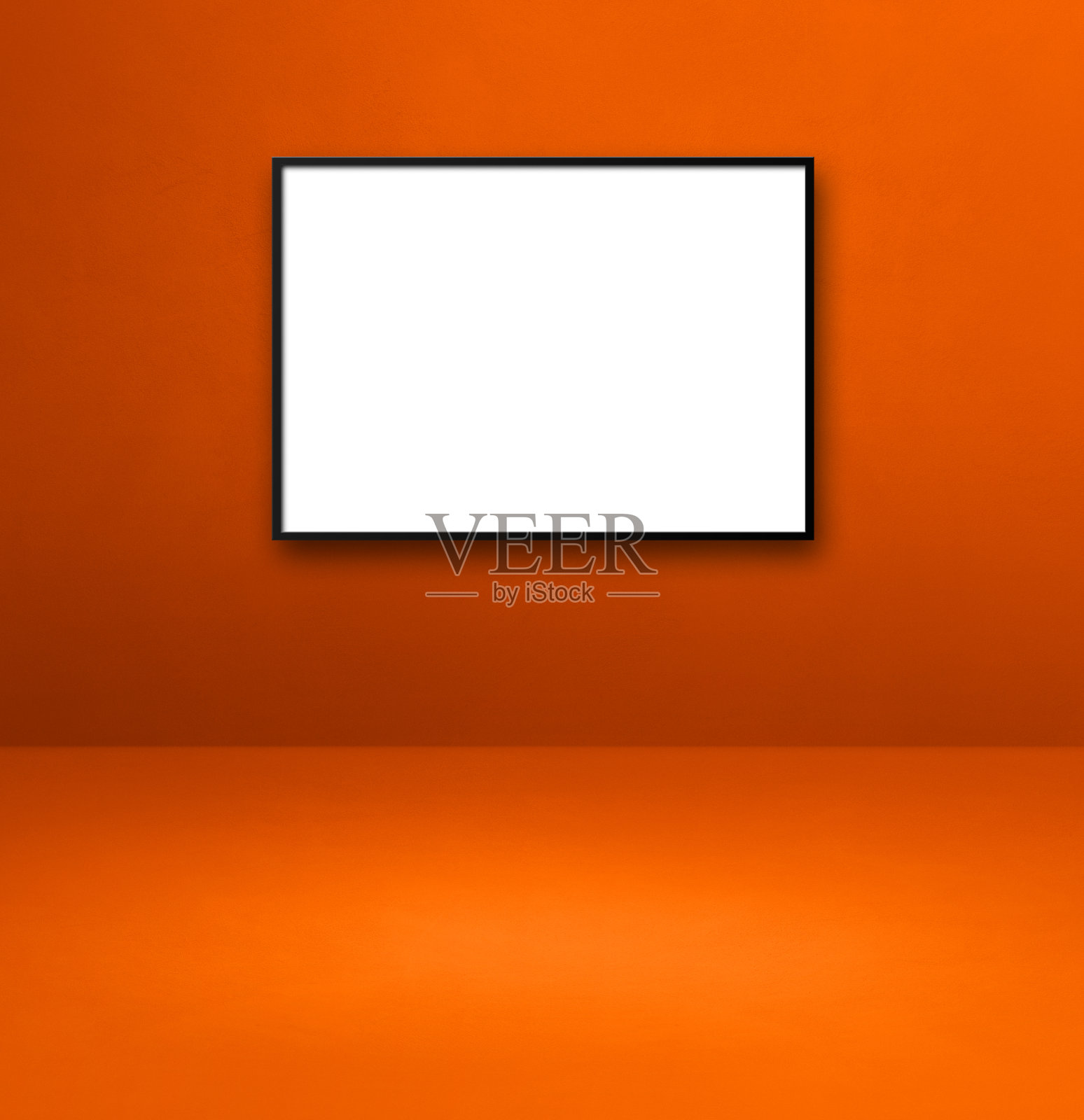 黑色的画框挂在橙色的墙上照片摄影图片