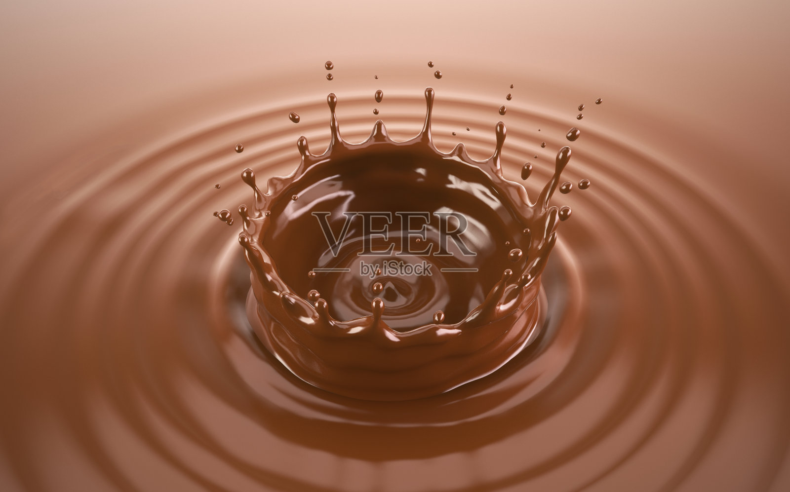 液体巧克力皇冠溅起涟漪照片摄影图片