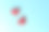 蓝色背景上的两颗红色折纸心。从以上观点。情人节的概念素材图片