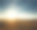 落日的余晖照耀着山丘和田野的天空素材图片