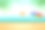 夏日海滩与彩虹伞和蓝天背景。素材图片